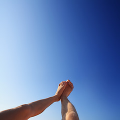 Image showing beautiful feet of man and woman in the summer