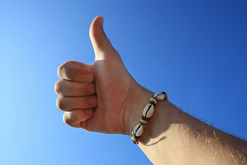 Image showing male hand thumbs up