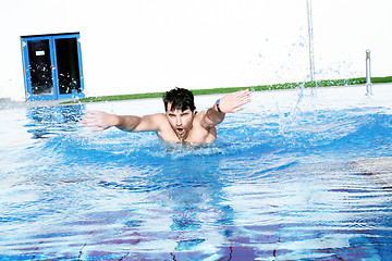 Image showing dynamic swimmer in swimming pool