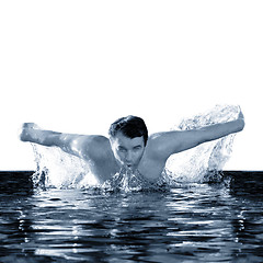 Image showing man swims using the butterfly  in pool