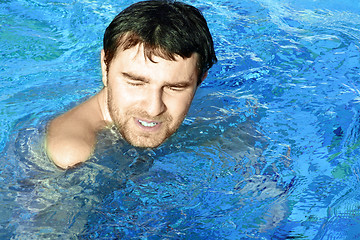 Image showing young man in swimming pool