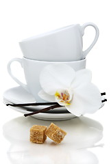 Image showing Tea cups, sugar and vanilla.