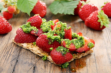 Image showing  Strawberry bruschetta with parsley pesto.