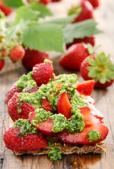 Image showing Strawberry toast with pesto and fresh strawberries.