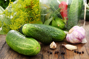 Image showing Cucumbers, herbs and spices for pickling.