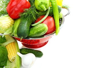 Image showing Summer vegetables and greens in a colander.