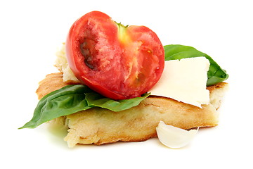 Image showing Pita bread, tomato, cheese and basil.