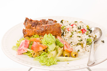 Image showing Roast lamb with rice and salad