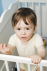 Image showing baby standing in his crib