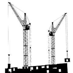 Image showing Silhouette of two cranes working on the building