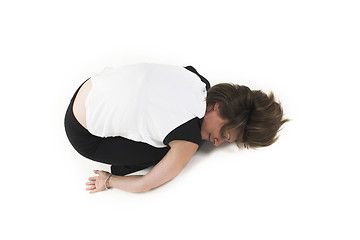 Image showing woman in white t-shirt doing yoga