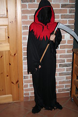 Image showing Halloween monster with scythe