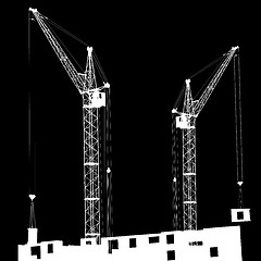 Image showing Silhouette of two cranes working on the building 