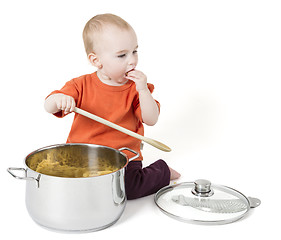 Image showing baby with big cooking pot