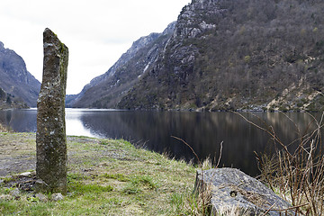 Image showing standing stone at coastline in norway