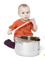 Image showing baby with big cooking pot