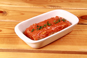 Image showing red lasagna isolated on wooden background