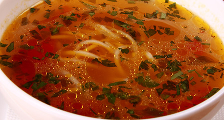 Image showing Bowl of Bright Red Creamy Tomato Soup with Yogurt