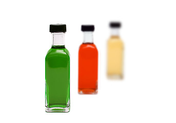 Image showing Line of glass bottles