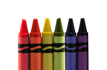 Image showing six used colored vax crayons form rainbow