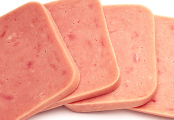 Image showing stack from sausage slices isolated on the white background