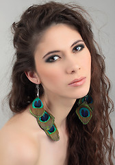 Image showing Portrait of beautiful girl with cute earrings