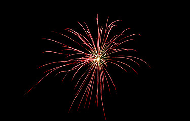Image showing an red firework explosion in the night sky