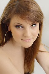 Image showing Portrait of beautiful young woman with long straight brown hair