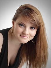 Image showing Portrait of beautiful young woman with long straight brown hair