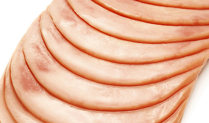 Image showing stack from sausage slices isolated on the white background