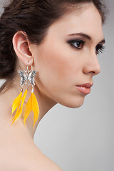 Image showing profil of a beautiful girls with earrings