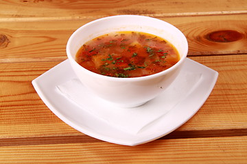 Image showing Bowl of Bright Red Creamy Tomato Soup with Yogurt
