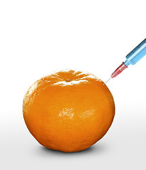 Image showing syringe sticked into orange,GMO