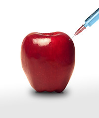 Image showing Apple GMO. Apple and syringe