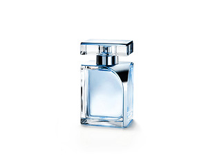 Image showing Perfume bottle on a glass surface