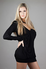 Image showing Young blonde woman posing in stylish dress