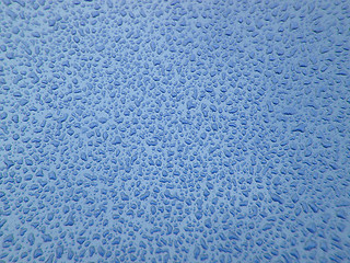 Image showing Water droplets on blue background