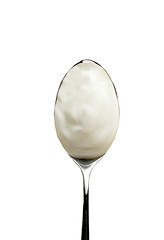 Image showing Spoon of yogurt isolated on white