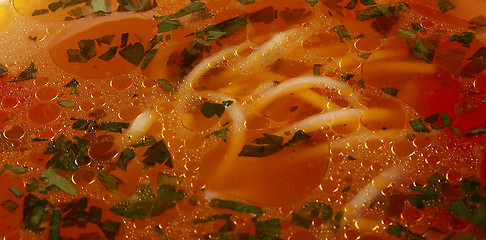 Image showing Close-up of soup with noodles