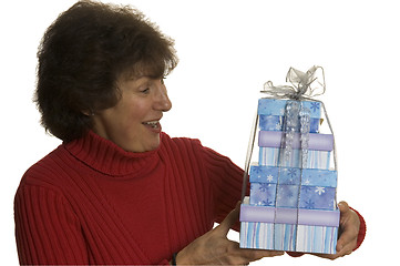 Image showing happy woman with gifts stack