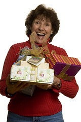 Image showing happy woman with gifts stack