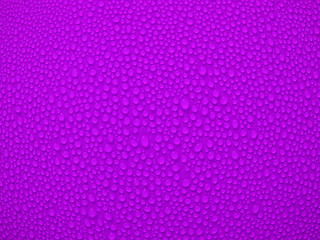 Image showing Water drop om purple background