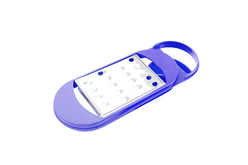 Image showing A grater with a violet handle on a white background