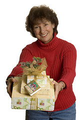 Image showing happy woman with gifts stack