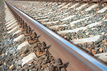 Image showing Rusty bolts on the railway