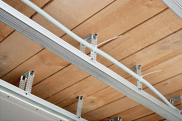 Image showing New electrical wiring in a suspended ceiling