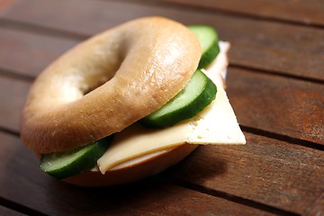 Image showing fresh cheese and ham bagel 