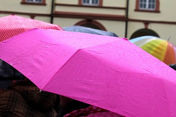 Image showing rainy day umbrellas