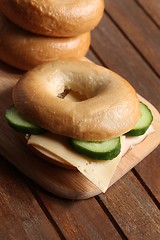 Image showing fresh cheese and ham bagel 