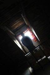 Image showing guy on the attic